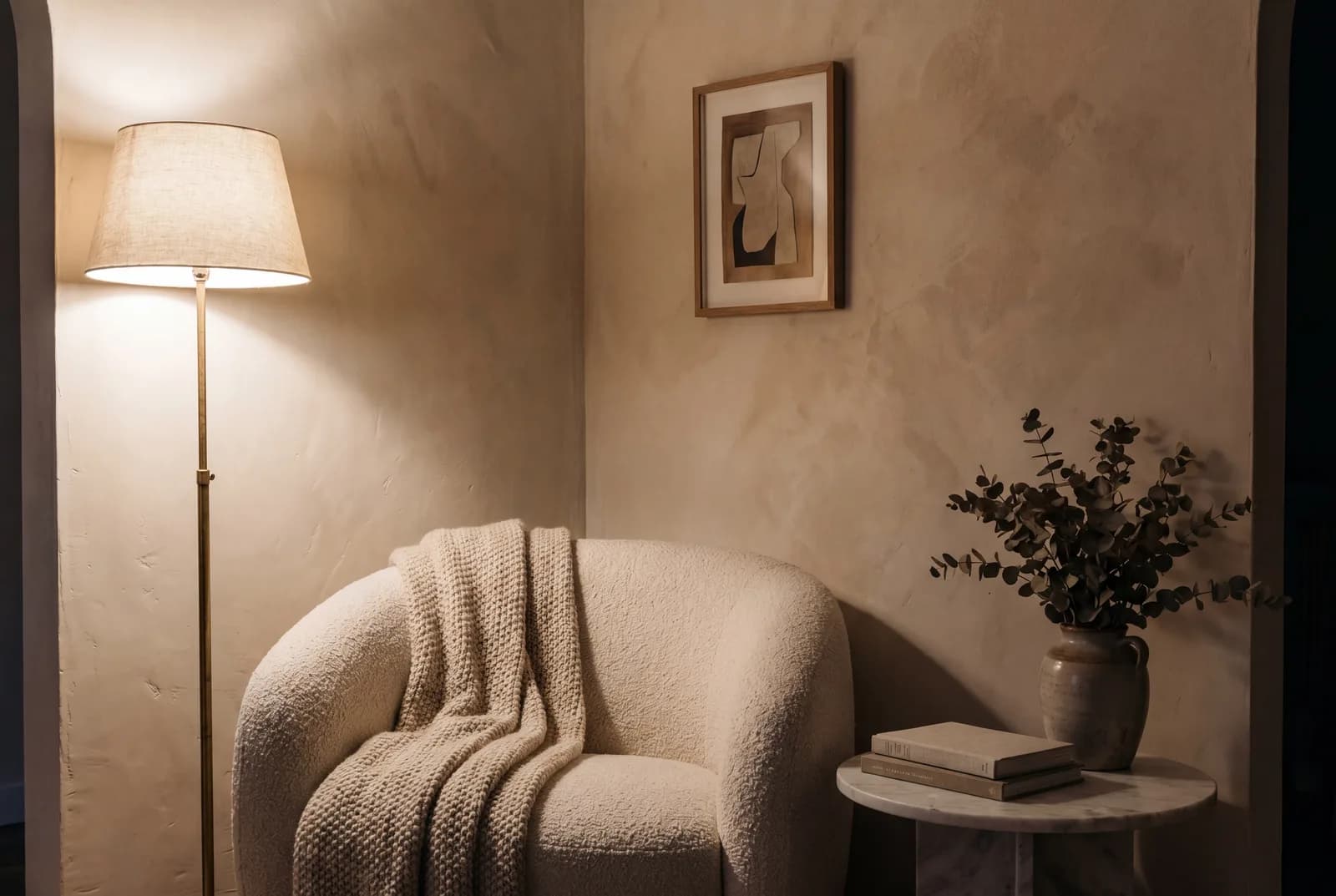 Tastefully styled living corner with warm lamp light